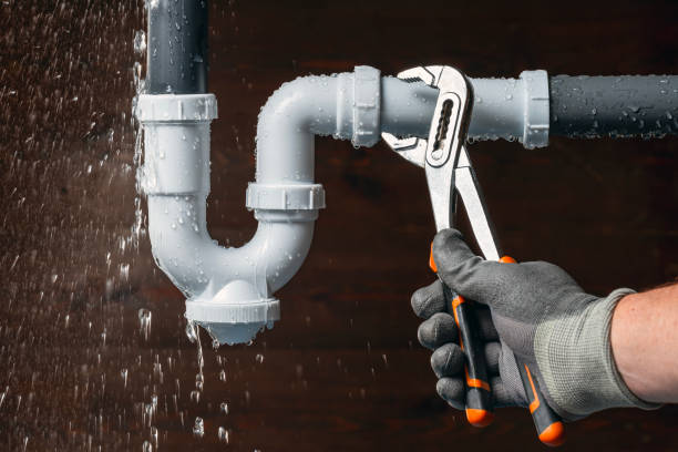 Professional Sewer Line Repair technician working in Midland, WA